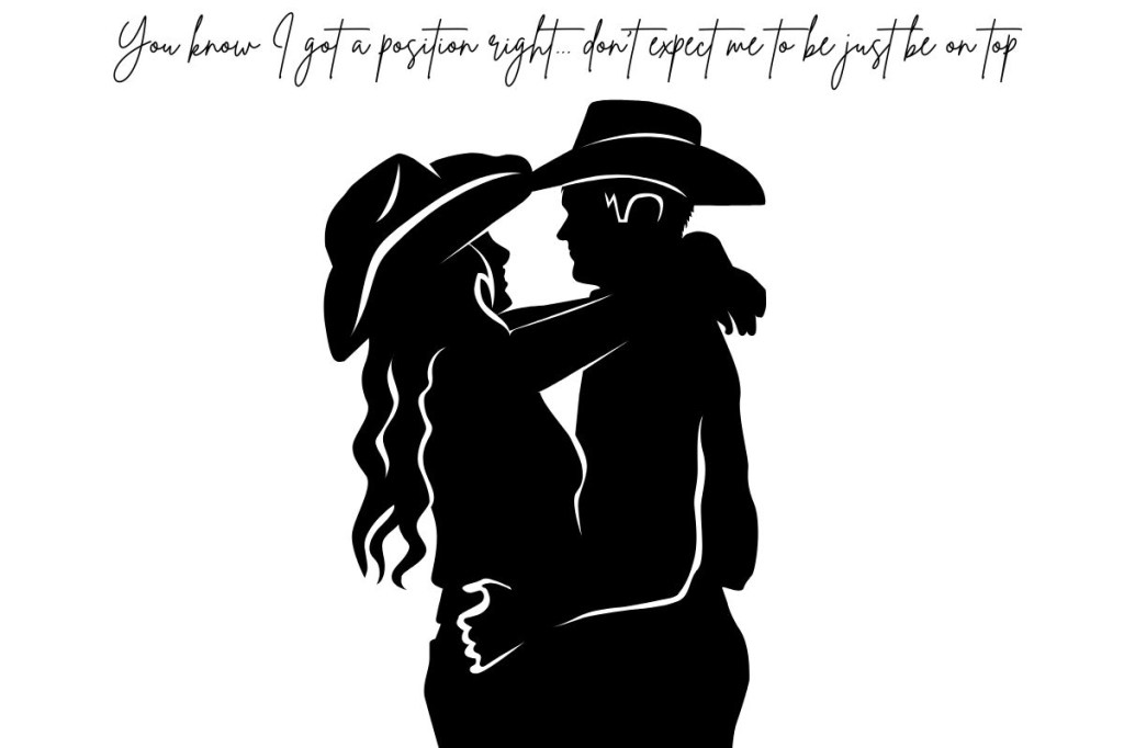 A cowgirl and cowboy couple holding each other in embrace