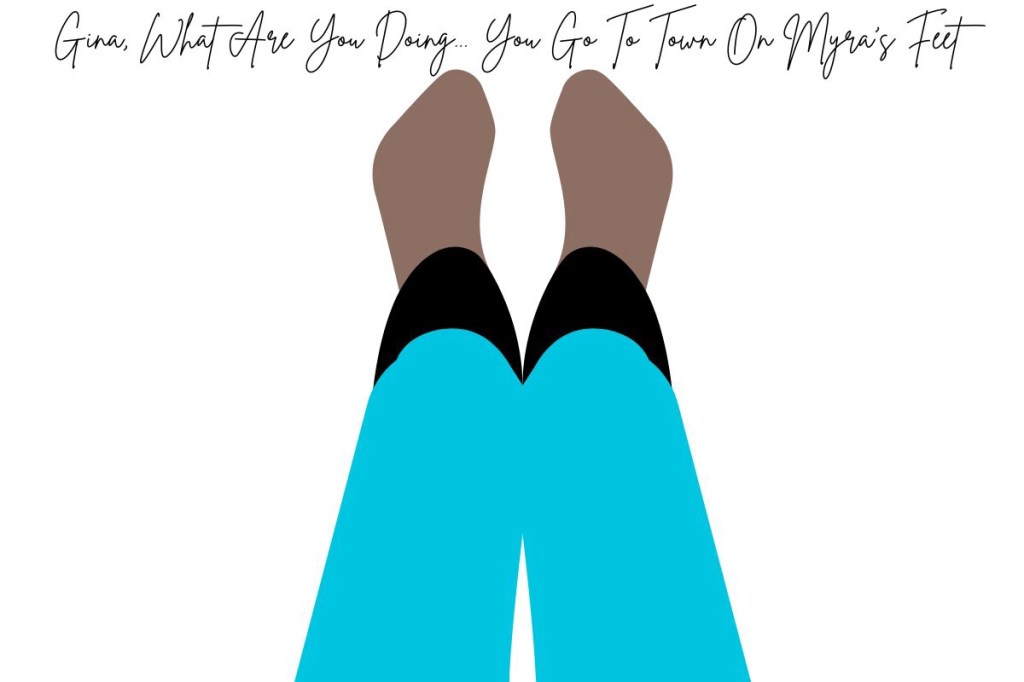 A young woman holding up her feet