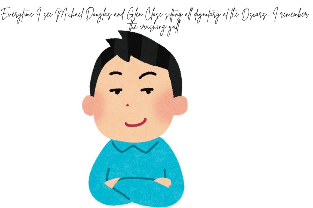 A young man sitting with a smirk on his face