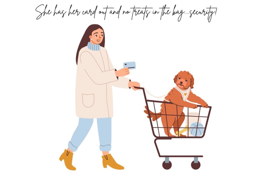 A woman pushing her cart with her dog